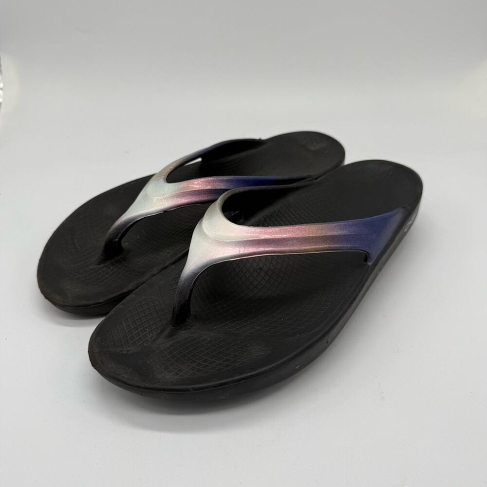 OOFOS Women's Black Flip Flop Sandals with Iridescent Pink-Purple-Blue Straps